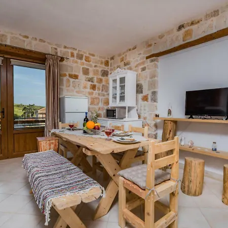 Windmill Near Shipwreck By 