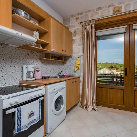 Windmill Near Shipwreck By 