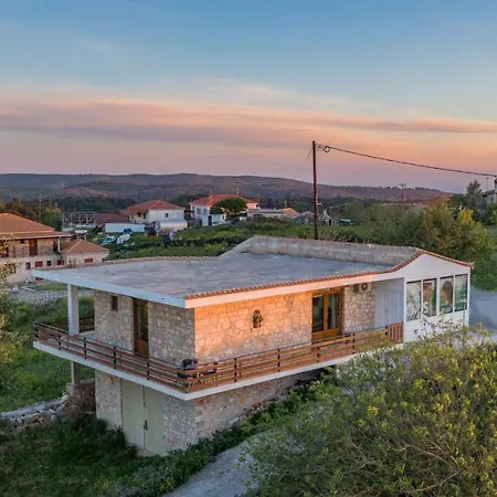 Windmill Near Shipwreck By 